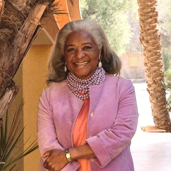 Meryanne by palm tree - Meryanne Loum-Martin